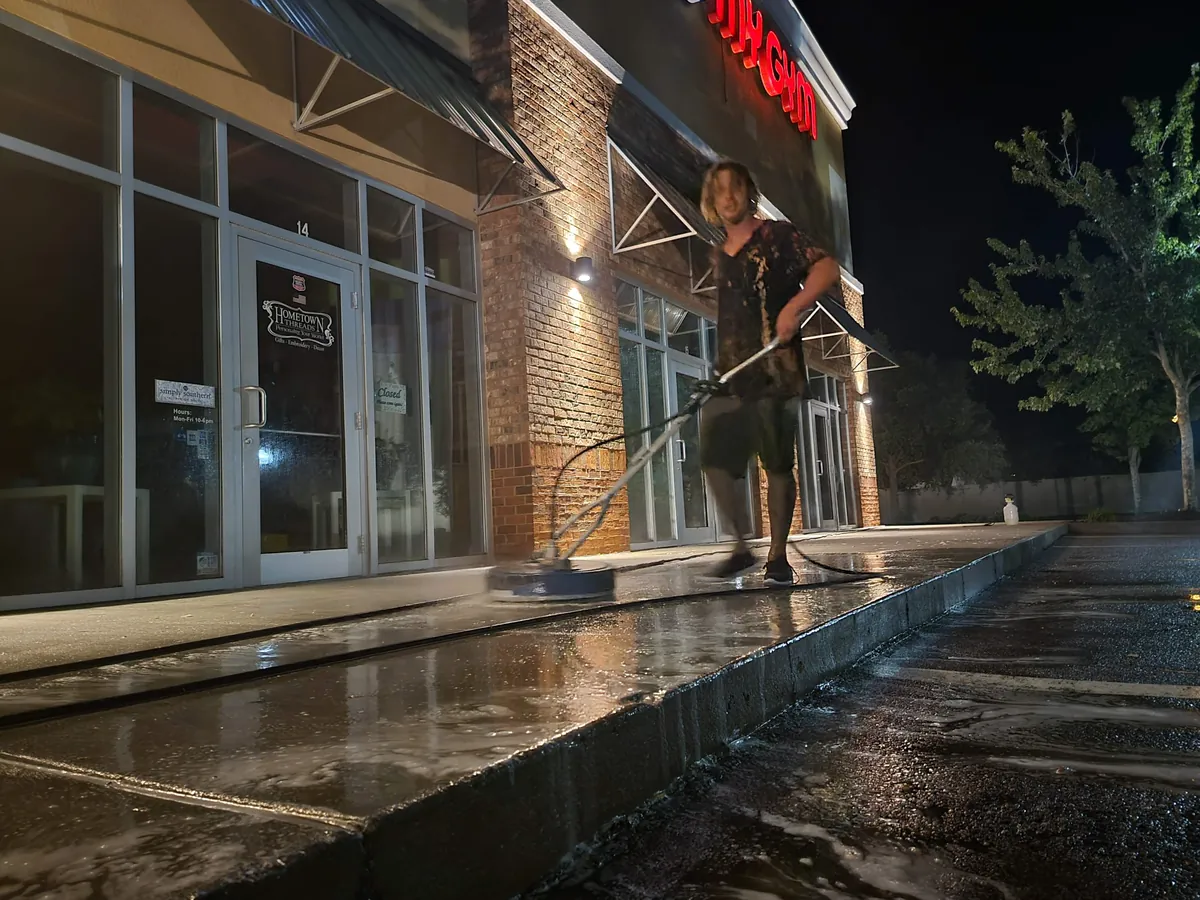 Safe Touch surface-cleaning sidewalks in front of storefronts at the Beach Boulevard retail center, Jacksonville