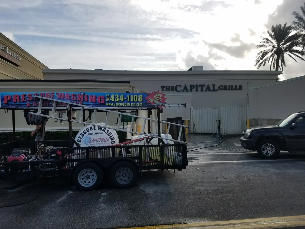 Safe Touch pressure washing trailer outside The Capital Grille restaurant in Jacksonville