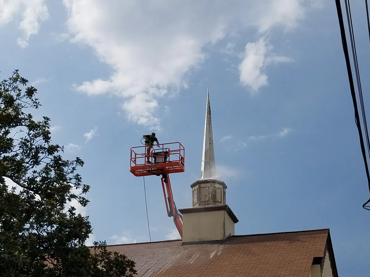 Boom-lift washing of a church campus steeple and roof in Jacksonville — Safe Touch archive job