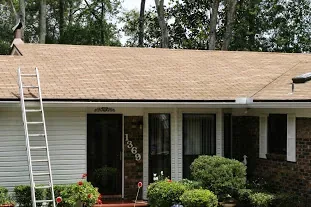 The same shingle roof after cleaning