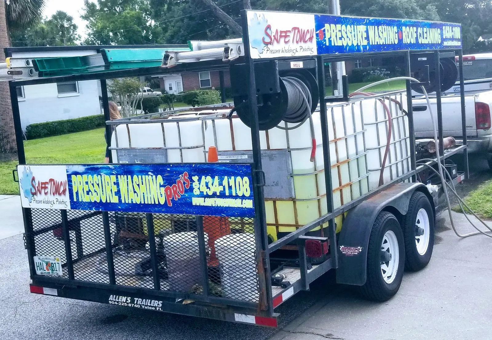 Safe Touch equipment trailer parked beside a road